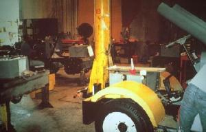 Bucket brigade workers assembling tractors