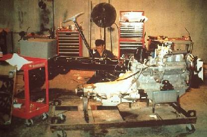 One worker assembling a tractor
